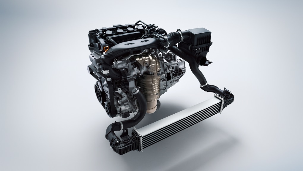 The Civic Si’s VTEC® engine on a white background.