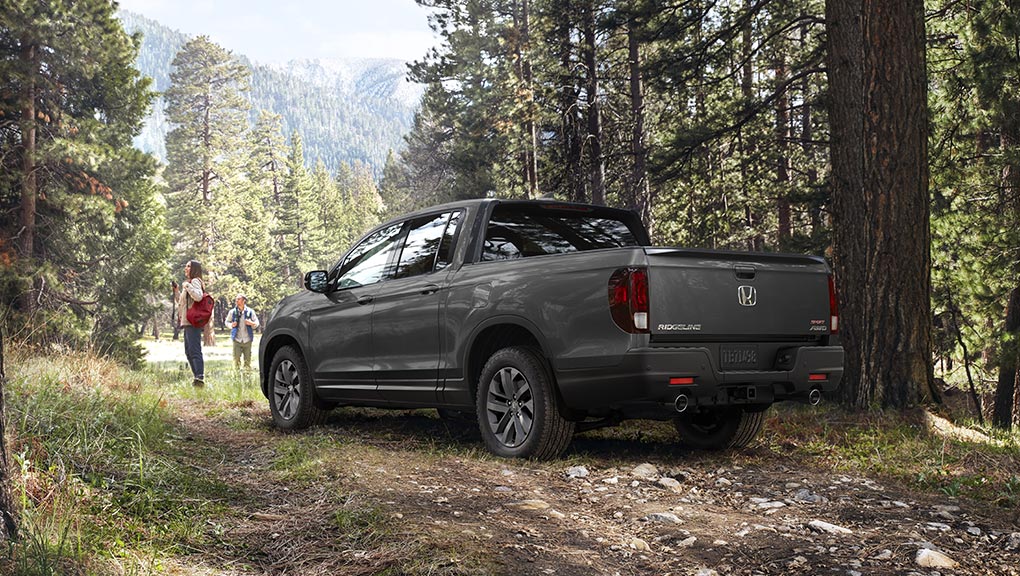 Image of 2021 Ridgeline driving on dirt road