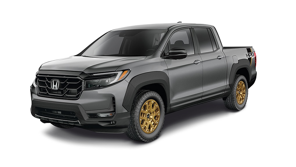 3/4 front view of the a dark grey Ridgeline with bronze wheels. 