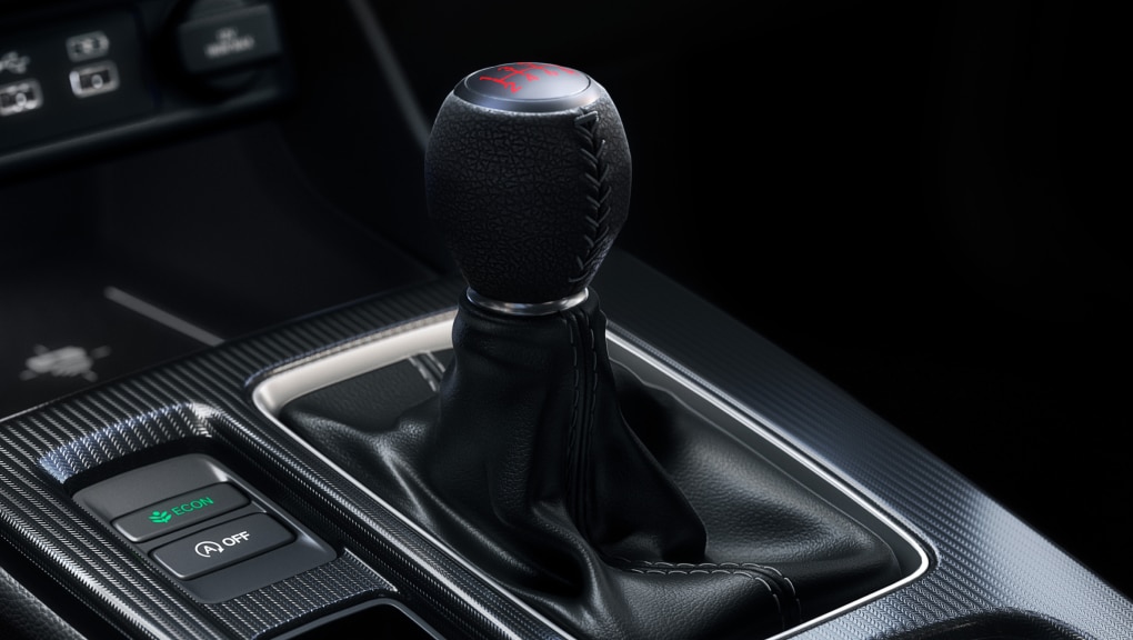 Close-up of Honda Civic Hatchback stick shift from driver’s seat