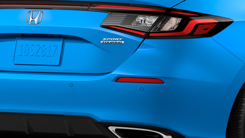 Side rear view of blue Honda Civic Hatchback 